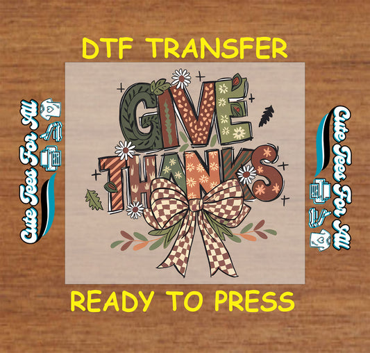 Give Thanks text with fall leaves, flowers, and large checkered bow Thanksgiving ready to press dtf transfer for DIY shirts.