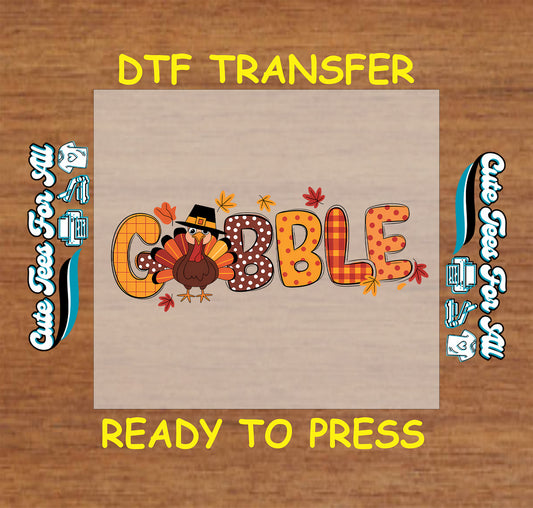 Gobble text with patterned letters and turkey Thanksgiving ready to press dtf transfer for DIY shirts.