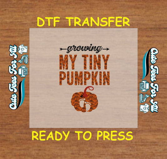 Growing My Tiny Pumpkin pregnancy announcement ready to press dtf transfer with baby feet silhouette in pumpkin.