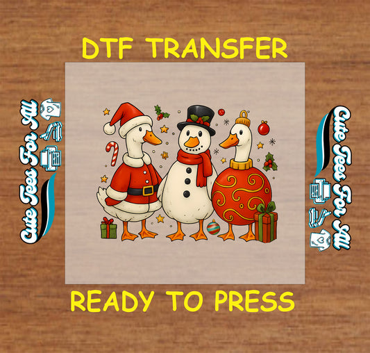 Christmas DTF transfer with geese in Santa and ornament outfits and snowman, ready to press dtf