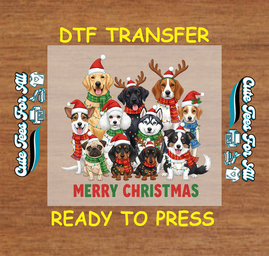 Christmas DTF transfer with group of festive dogs in Santa hats, scarves, and antlers, with “Merry Christmas” text, ready to press iron on heat transfer for DIY shirts.
