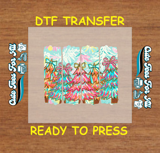 Christmas DTF transfer with colorful trees, bows, and rustic wood panels in pink, teal, and gold, ready to press iron on heat transfer for DIY shirts.