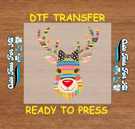 Christmas DTF transfer with colorful patterned reindeer head wearing a black bow, ready to press dtf heat transfer for diy shirts
