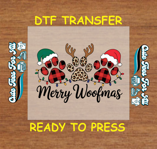 Christmas DTF transfer with Merry Woofmas text, festive dog paw prints, Santa hats, antlers, and holiday lights.