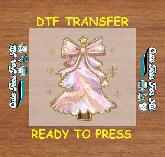 Christmas DTF transfer with pink iridescent tree, gold bow, gold star, and snowflakes, ready to press dtf for DIY shirts