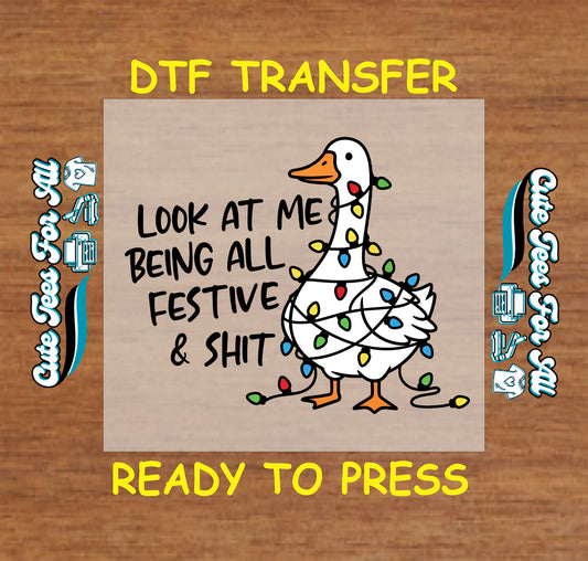 Funny goose wrapped in Christmas lights with quote look at me being all festive ready to press DTF iron on heat transfer for DIY shirts