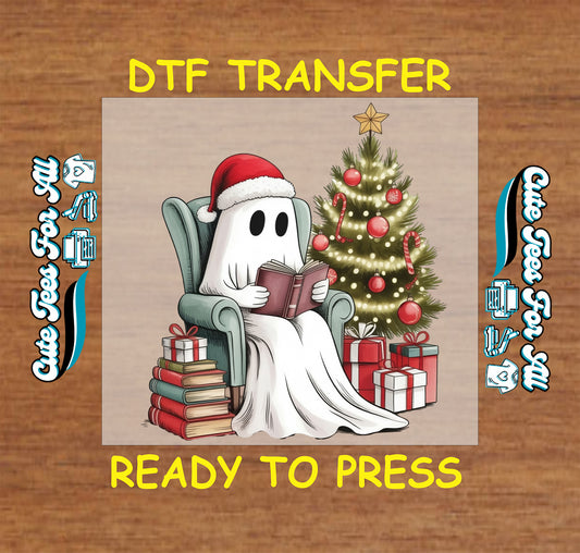Cozy ghost in Santa hat reading by Christmas tree ready to press DTF transfer with presents and books