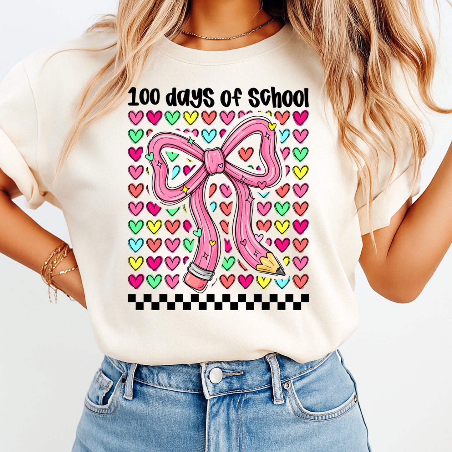 women wearing shirt with 100 days of school pencil bow with colorful hearts