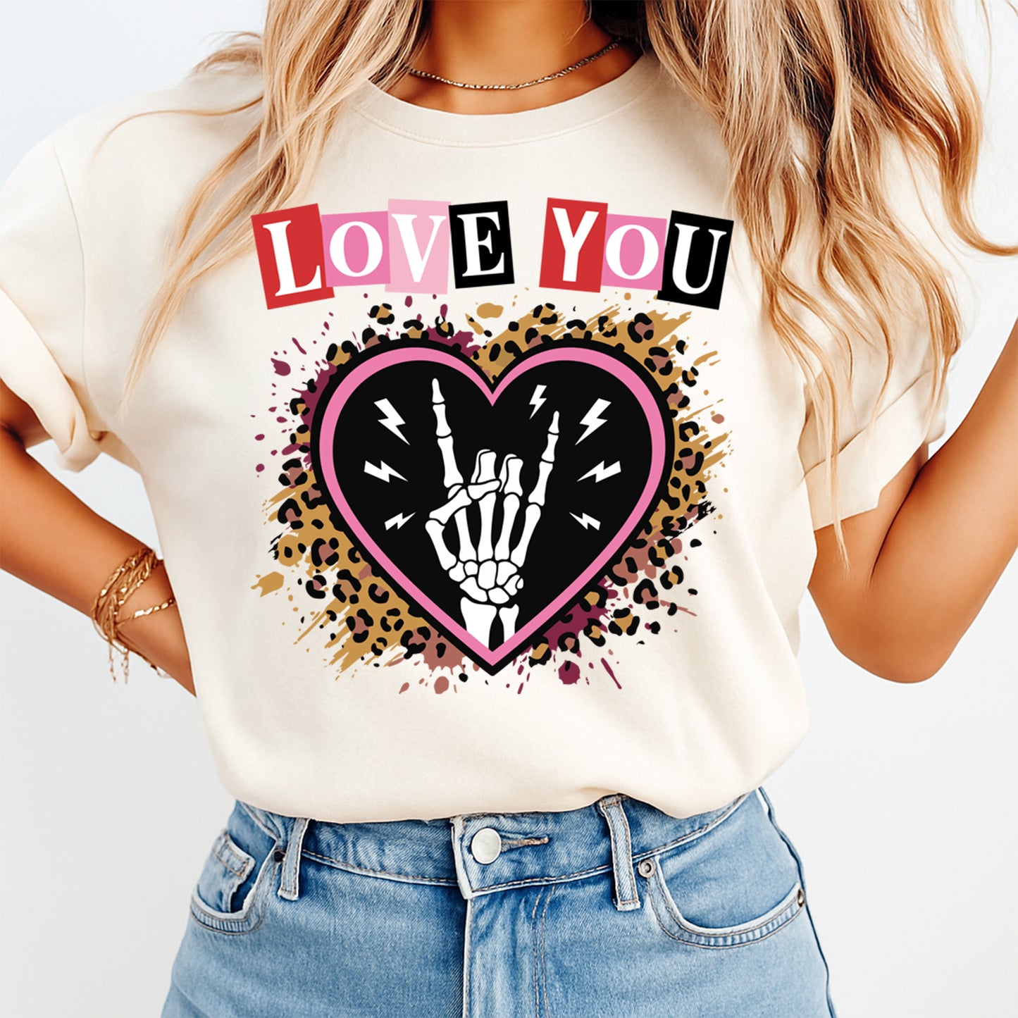 women wearing shirt with love you skeleton hand heart design