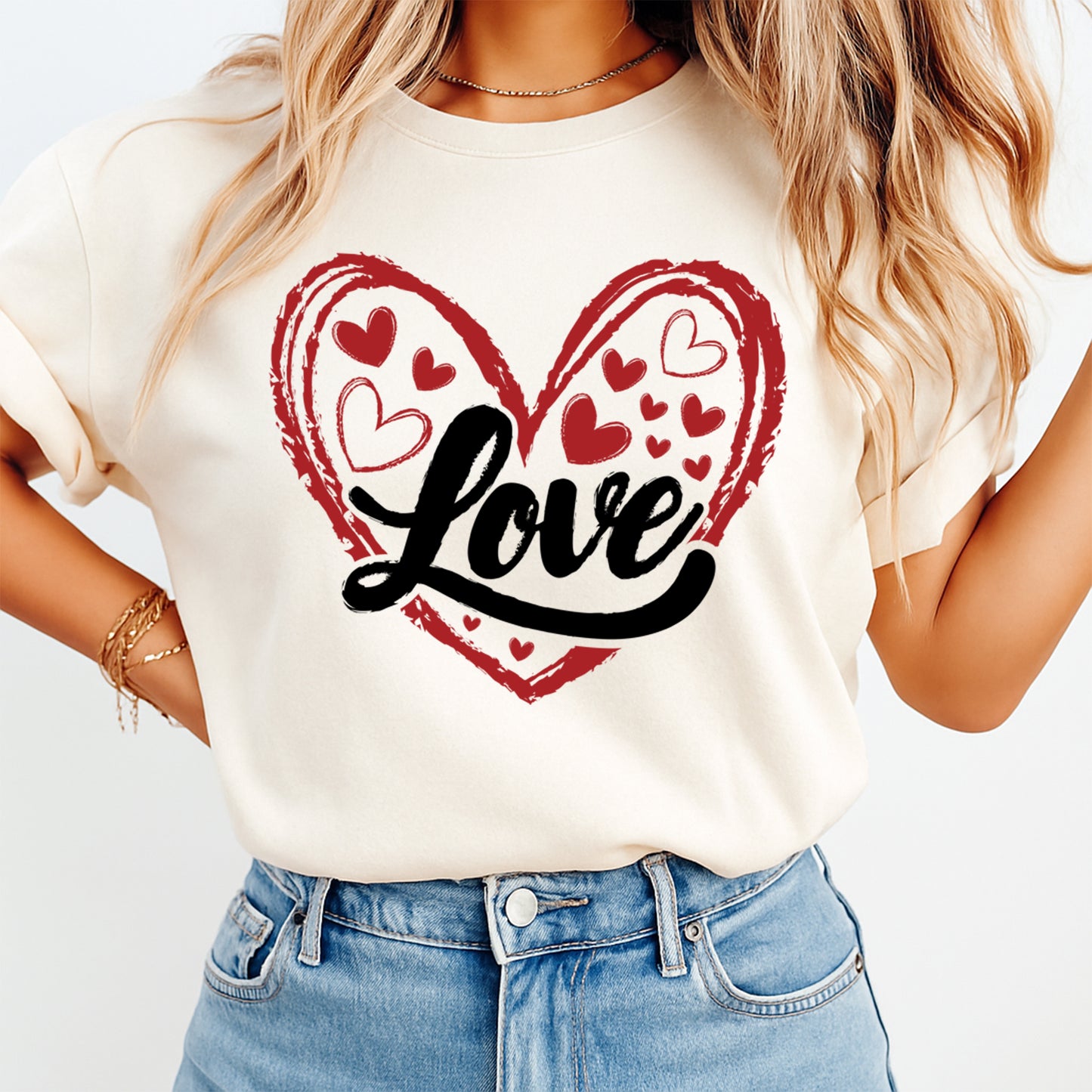Cream shirt mockup showing Valentine’s Day Love heart graphic with black script lettering and red sketched heart design