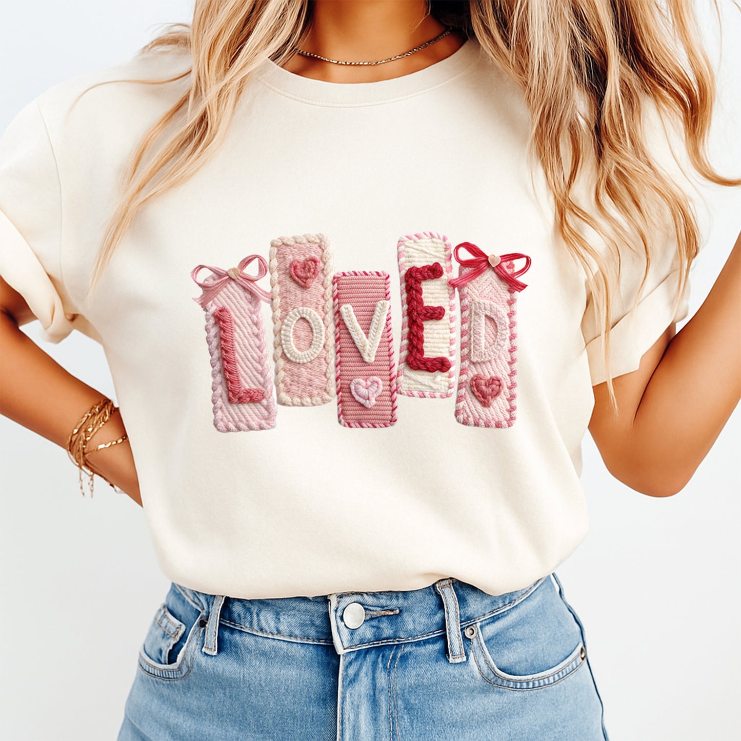 Valentine’s Day LOVE pink yarn lettering iron on heat transfer shown on cream t shirt mockup romantic Valentine themed apparel print