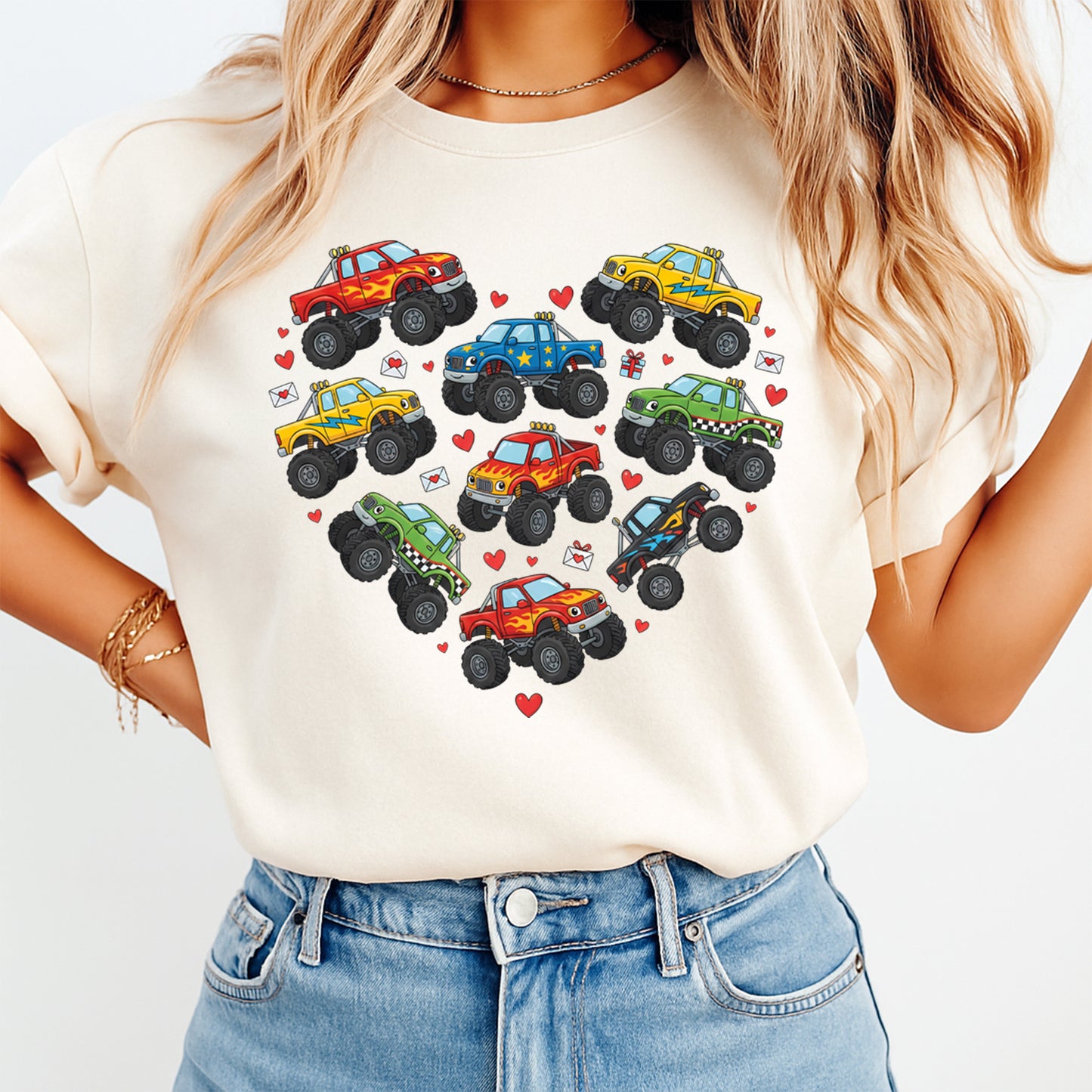 Ready to press dtf Valentine monster truck transfer pressed on a shirt, featuring heart-shaped truck layout with colorful kids truck graphics