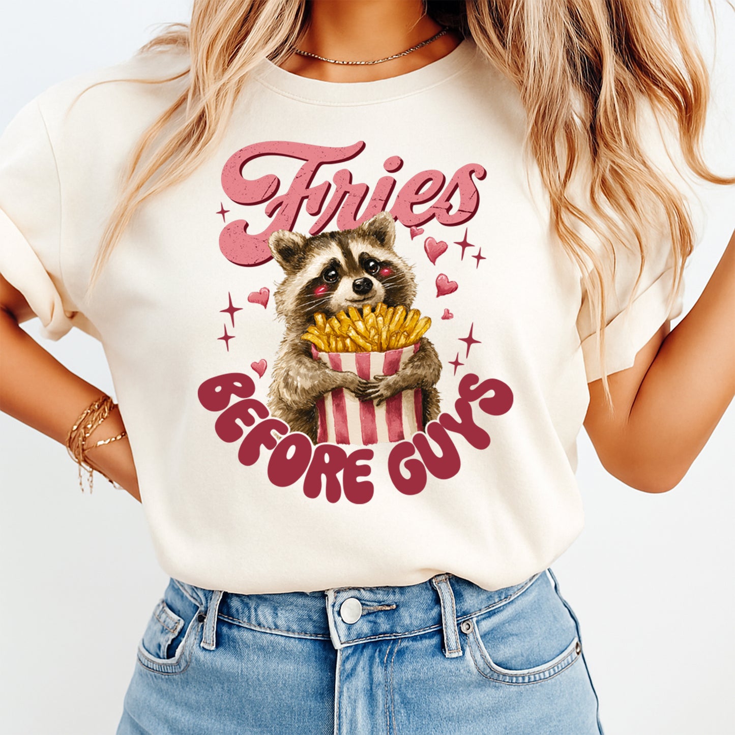 Valentine’s Day raccoon fries before guys graphic shirt mockup showing playful heart themed design on cream t shirt