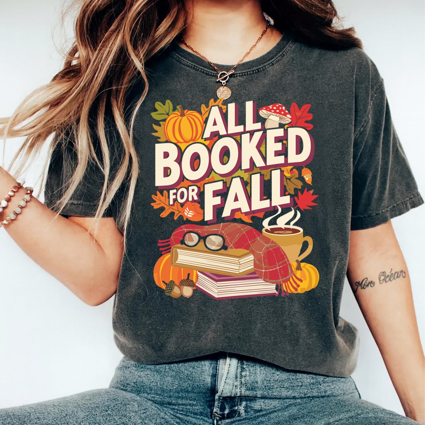 dark shirt mockup showing all booked for fall books pumpkin coffee autumn graphic