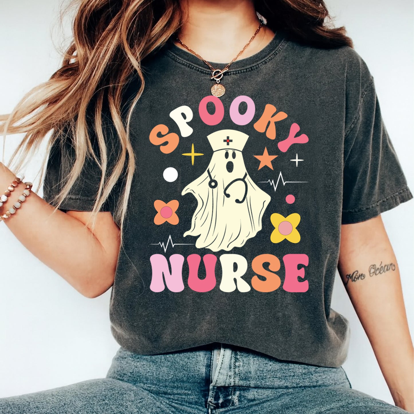dark shirt mockup showing spooky nurse ghost with stethoscope halloween graphic