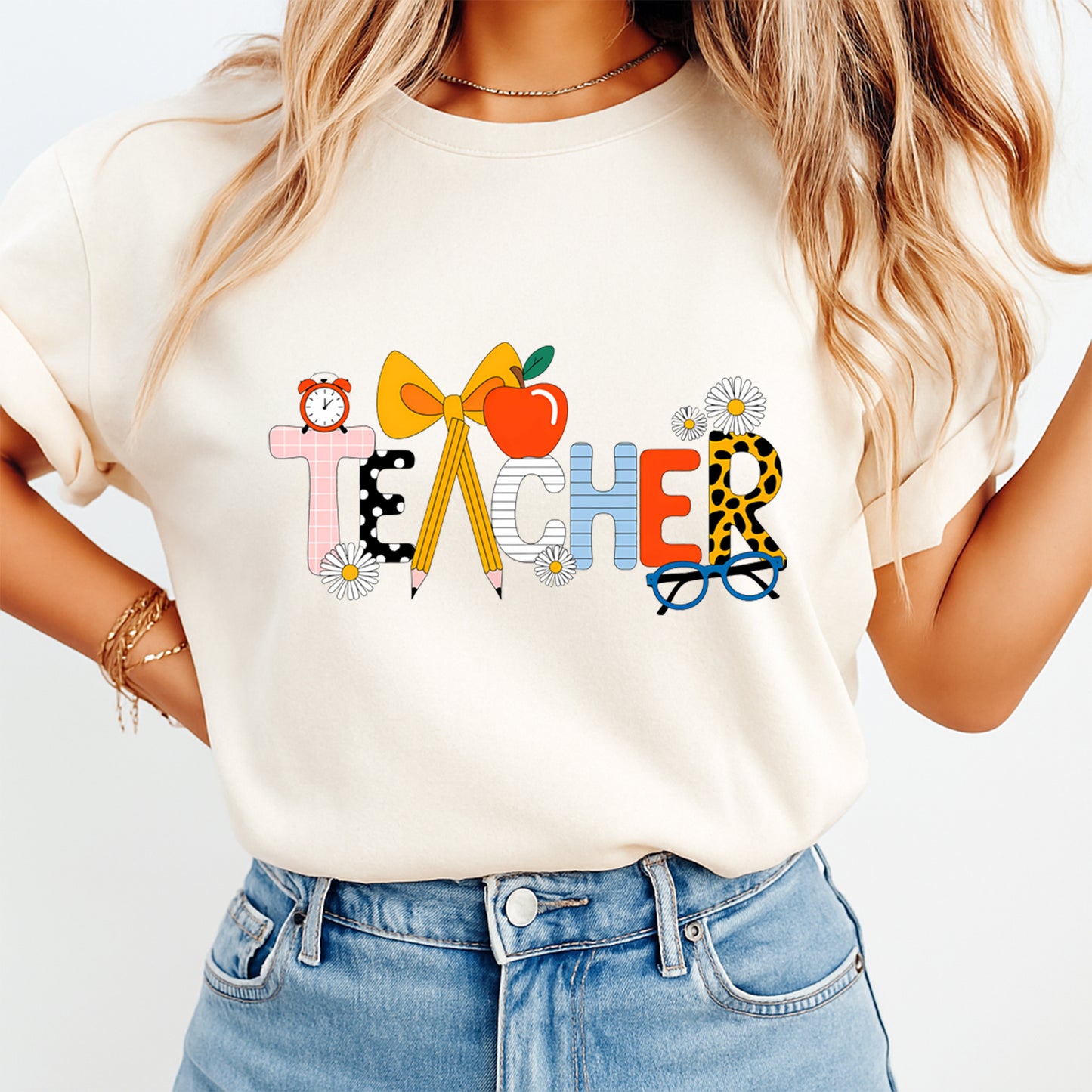 Teacher bow pencil apple graphic printed on shirt showing finished teacher themed apparel