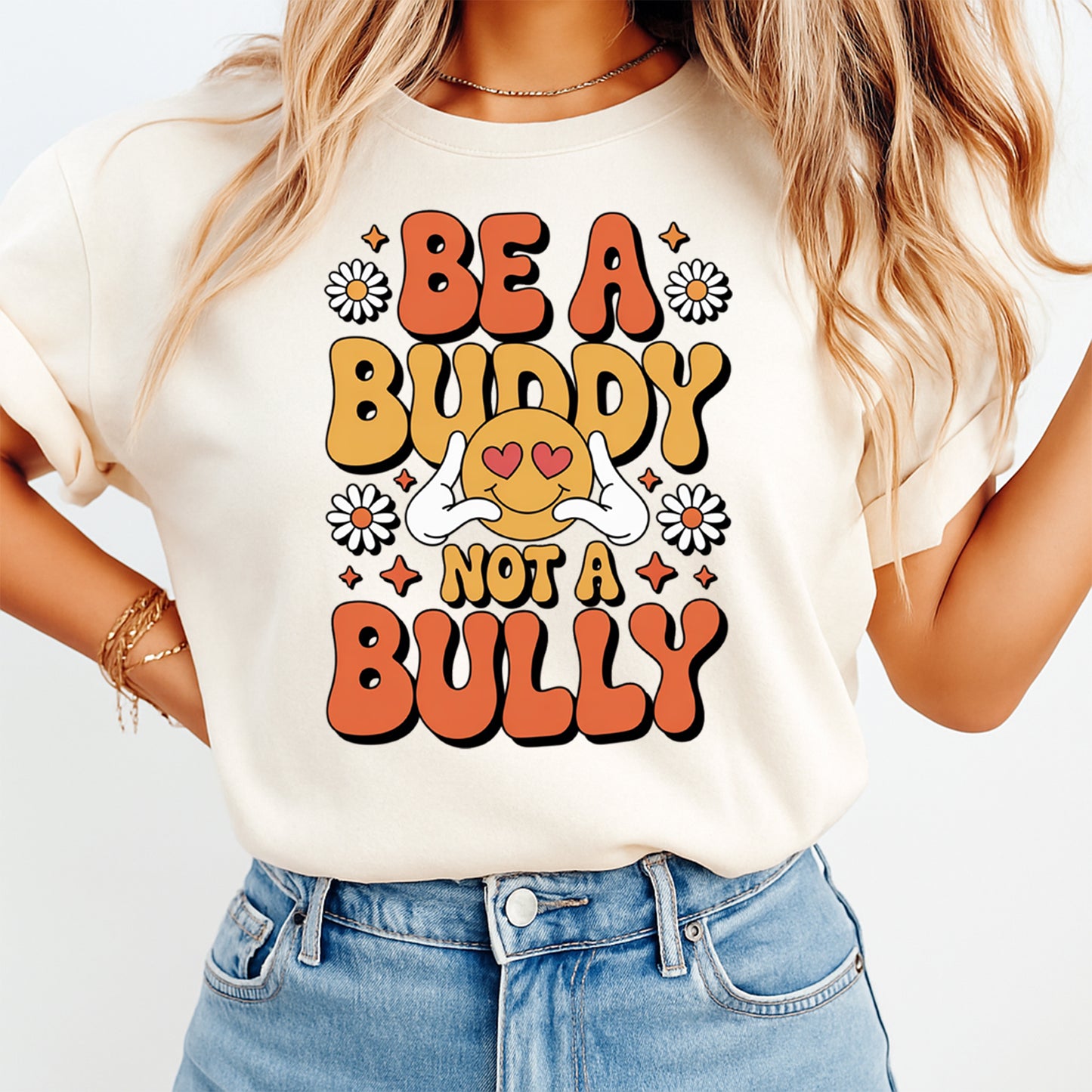 Be A Buddy Not A Bully anti bullying graphic printed on neutral t shirt with retro smiley and daisy artwork