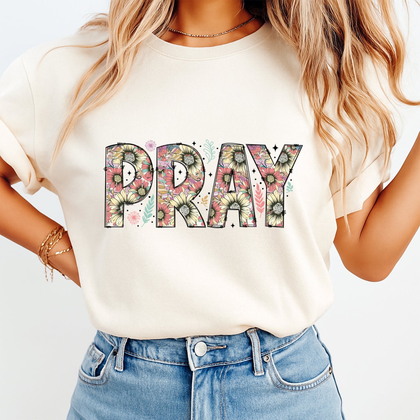 Pray floral graphic printed on t shirt featuring vintage botanical lettering Christian design