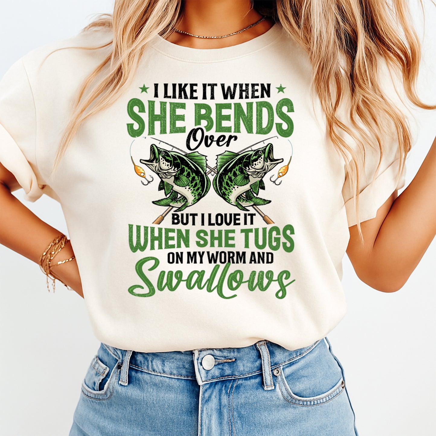 Woman wearing beige shirt with green bass fishing humor heat transfer graphic pressed on front