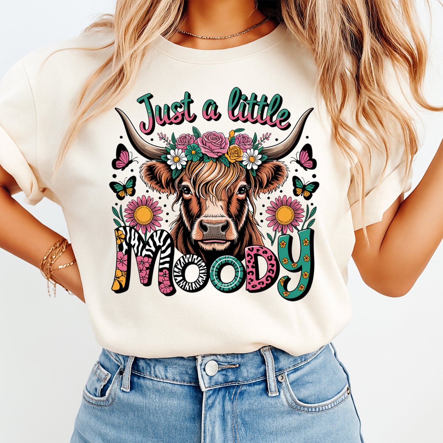 Western cow graphic shirt mockup featuring just a little moody floral crown cow design