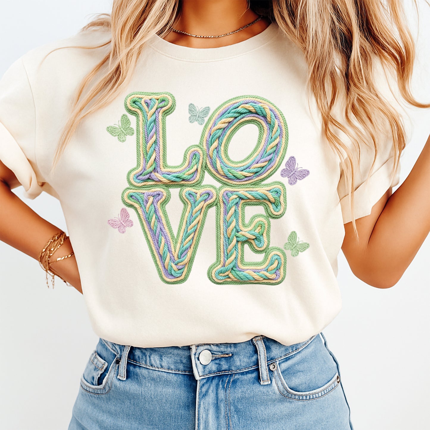 Spring pastel LOVE rope letter graphic printed on cream shirt with butterfly accents
