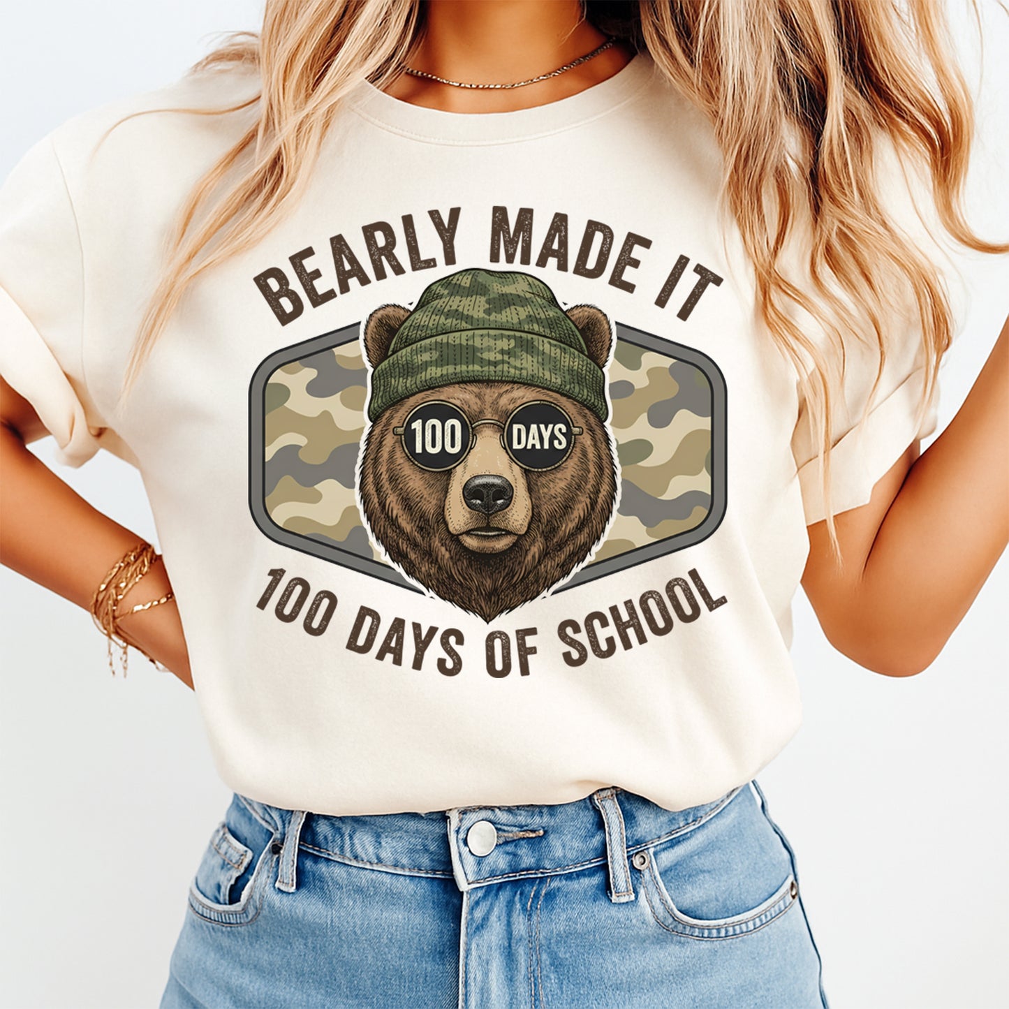 100 days of school bear graphic tee mockup featuring camo bear wearing sunglasses school shirt design