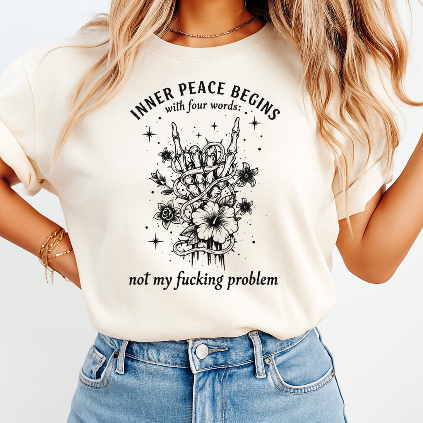 woman wearing inner peace begins not my fucking problem skeleton hand graphic shirt ready to press dtf heat transfer