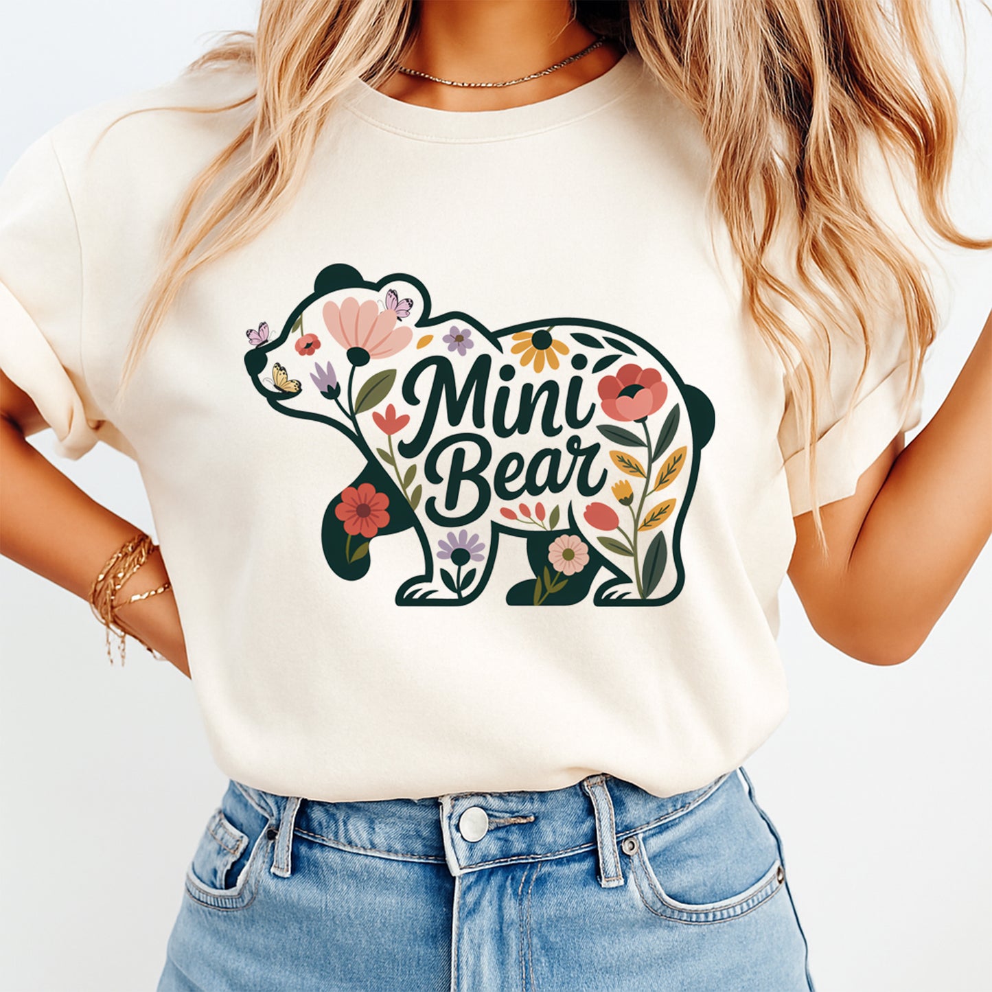 woman wearing shirt with floral mini bear design ready to press dtf transfer applied