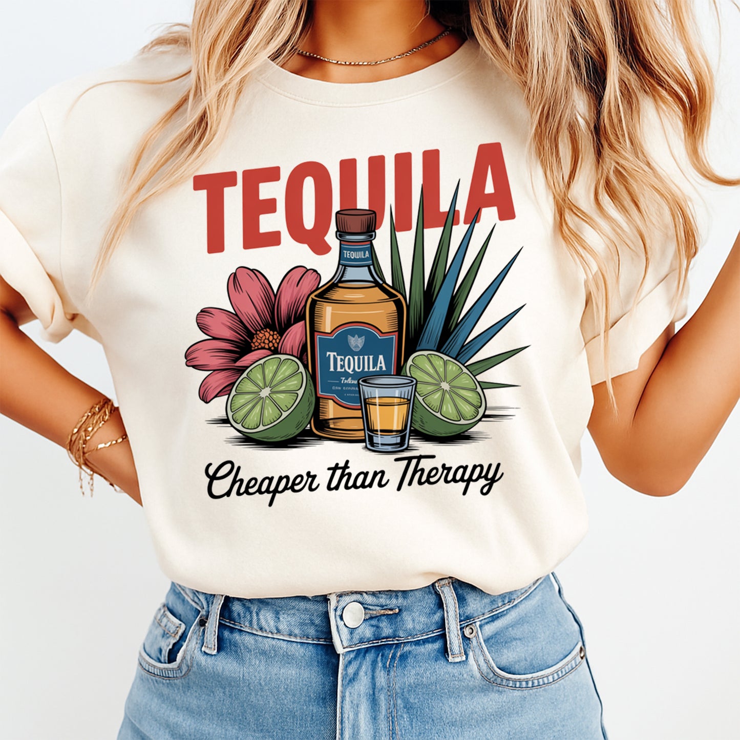Woman wearing a cream shirt with tequila cheaper than therapy ready to press dtf graphic featuring a tequila bottle shot glass limes and agave leaves