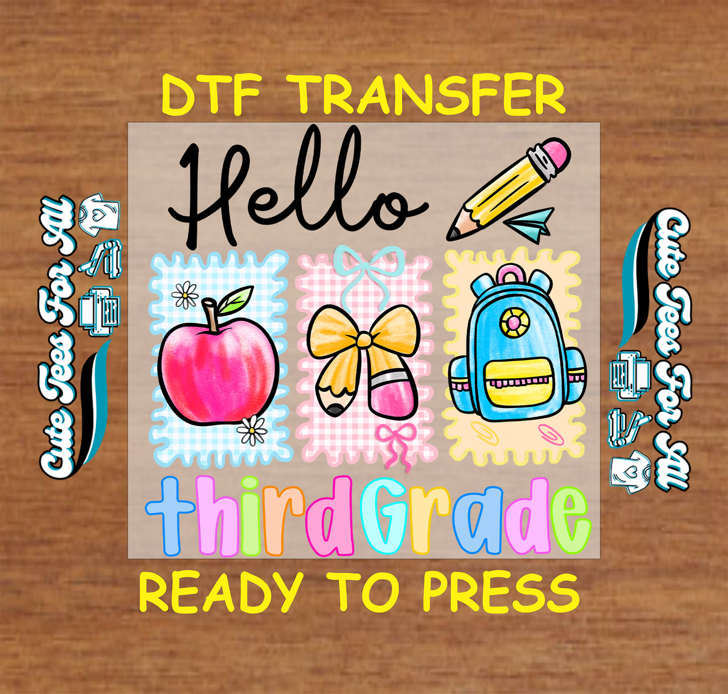DTF transfer with school-themed graphics on a wooden background