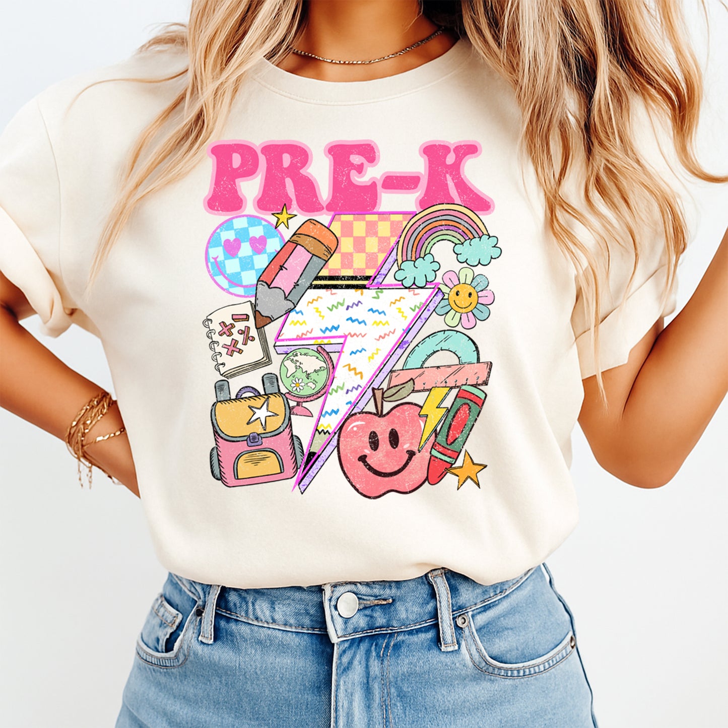 Person wearing a white t-shirt with colorful 'PRE-K' graphics and text.