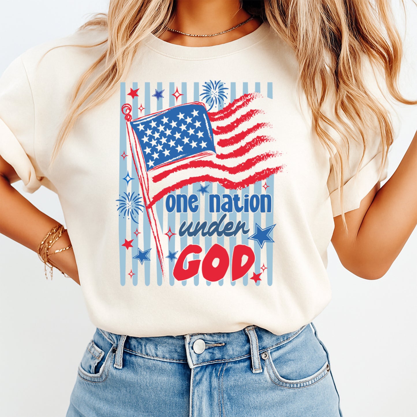 Person wearing a t-shirt with an American flag and 'one nation under God' text on a white background
