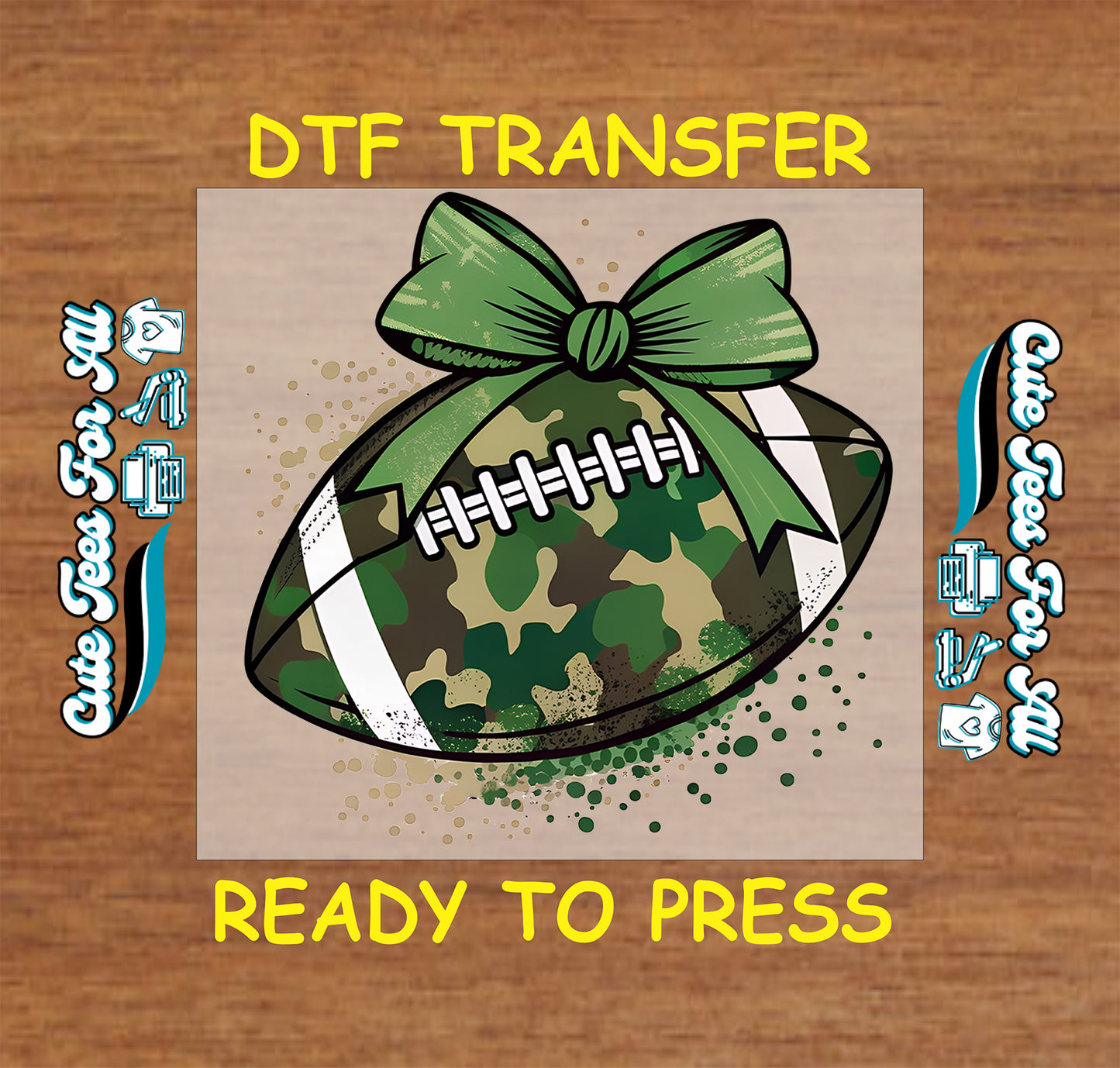 A digital graphic design for a football transfer featuring a green camouflage patterned football with a green ribbon bow, set against a light beige square on a brown wood-textured background. The text 'DTF TRANSFER' is written at the top and 'READY TO PRESS' at the bottom, with decorative text on both sides.