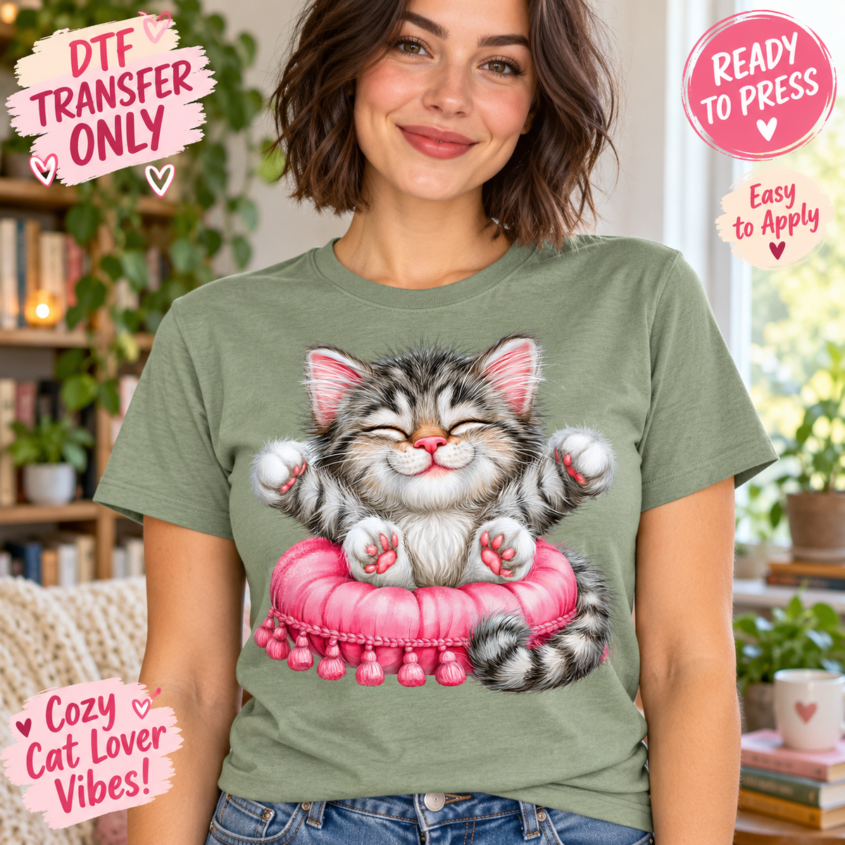 A woman wearing a sage green t-shirt with a graphic of a gray and white kitten sitting on a pink cushion, with text overlays highlighting transfer and application features.