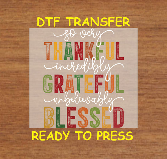 Thankful Grateful Blessed DTF transfer with bold fall colors and elegant script for Thanksgiving crafting