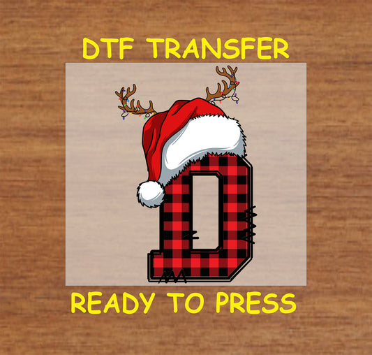 DTF transfer featuring a buffalo plaid letter "D" adorned with a Santa hat and reindeer antlers, perfect for custom Christmas apparel or gifts.