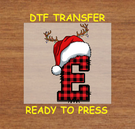 DTF transfer featuring a buffalo plaid letter "E" adorned with a Santa hat and reindeer antlers, perfect for custom Christmas apparel or gifts.