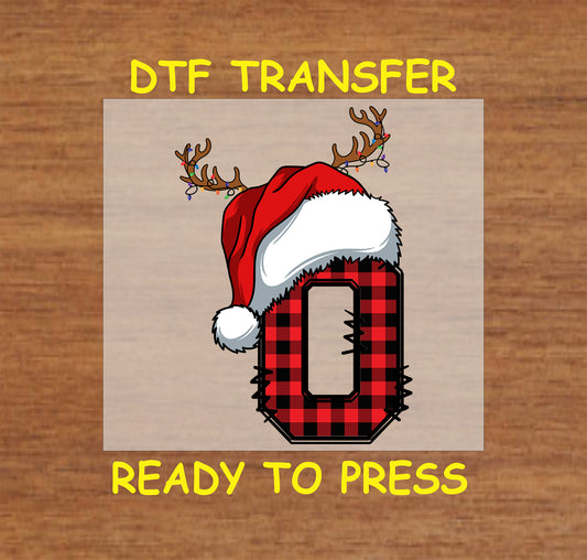 DTF transfer featuring a buffalo plaid letter "O" adorned with a Santa hat and reindeer antlers, perfect for festive holiday apparel and Christmas crafting.