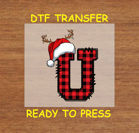 DTF transfer featuring a buffalo plaid letter "U" with a Santa hat and reindeer antlers, ideal for personalized Christmas crafts and festive apparel.