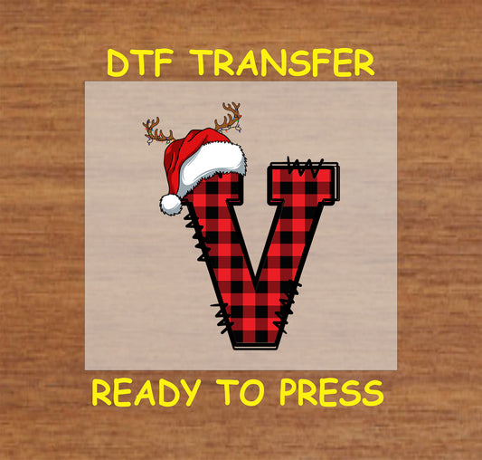 DTF transfer featuring a buffalo plaid letter "V" with a Santa hat and reindeer antlers, perfect for personalized Christmas crafts and festive apparel.