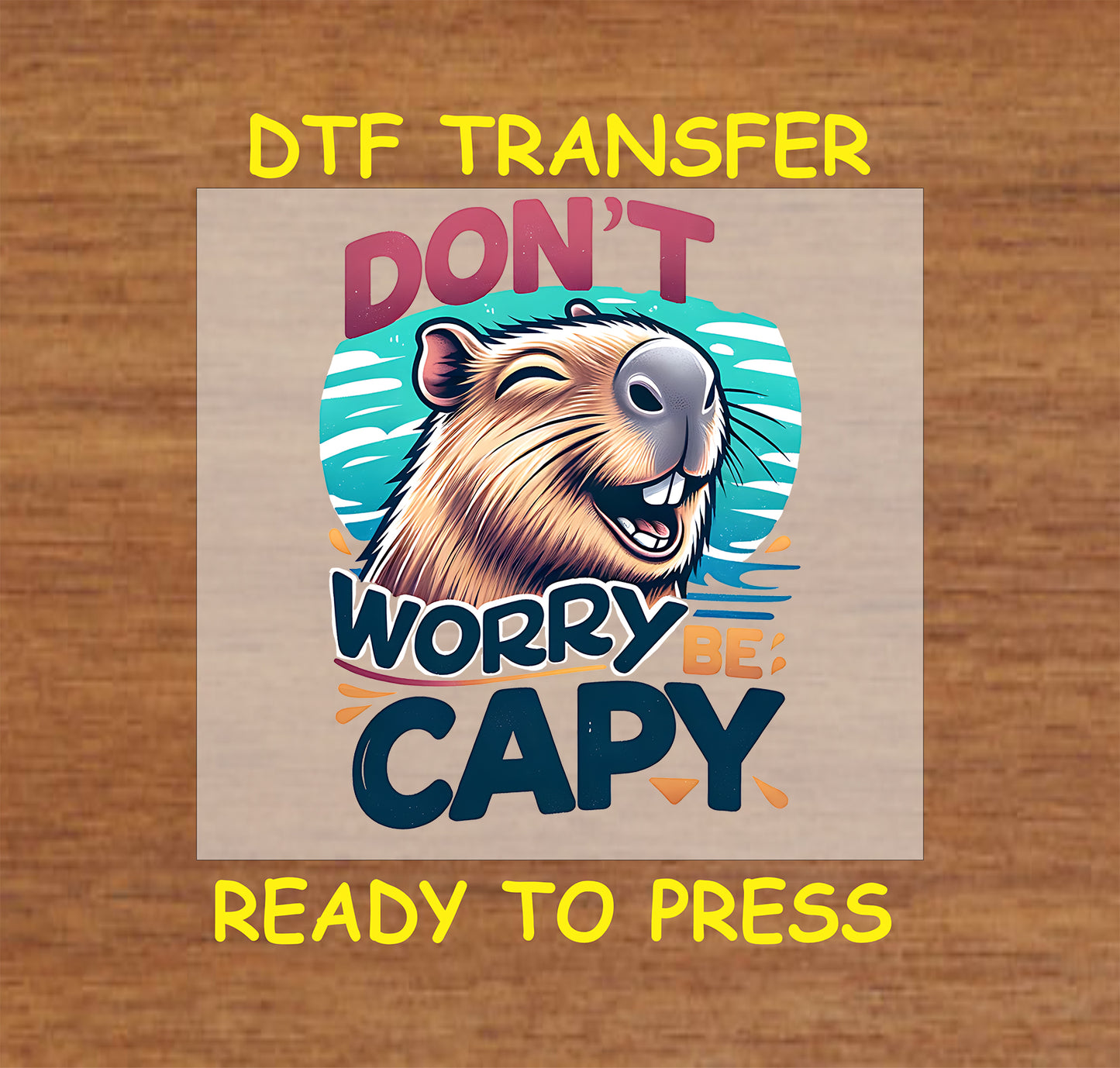 Don’t Worry Be Capy DTF transfer showing a cheerful capybara with a vibrant, sunny background and bold, colorful text.