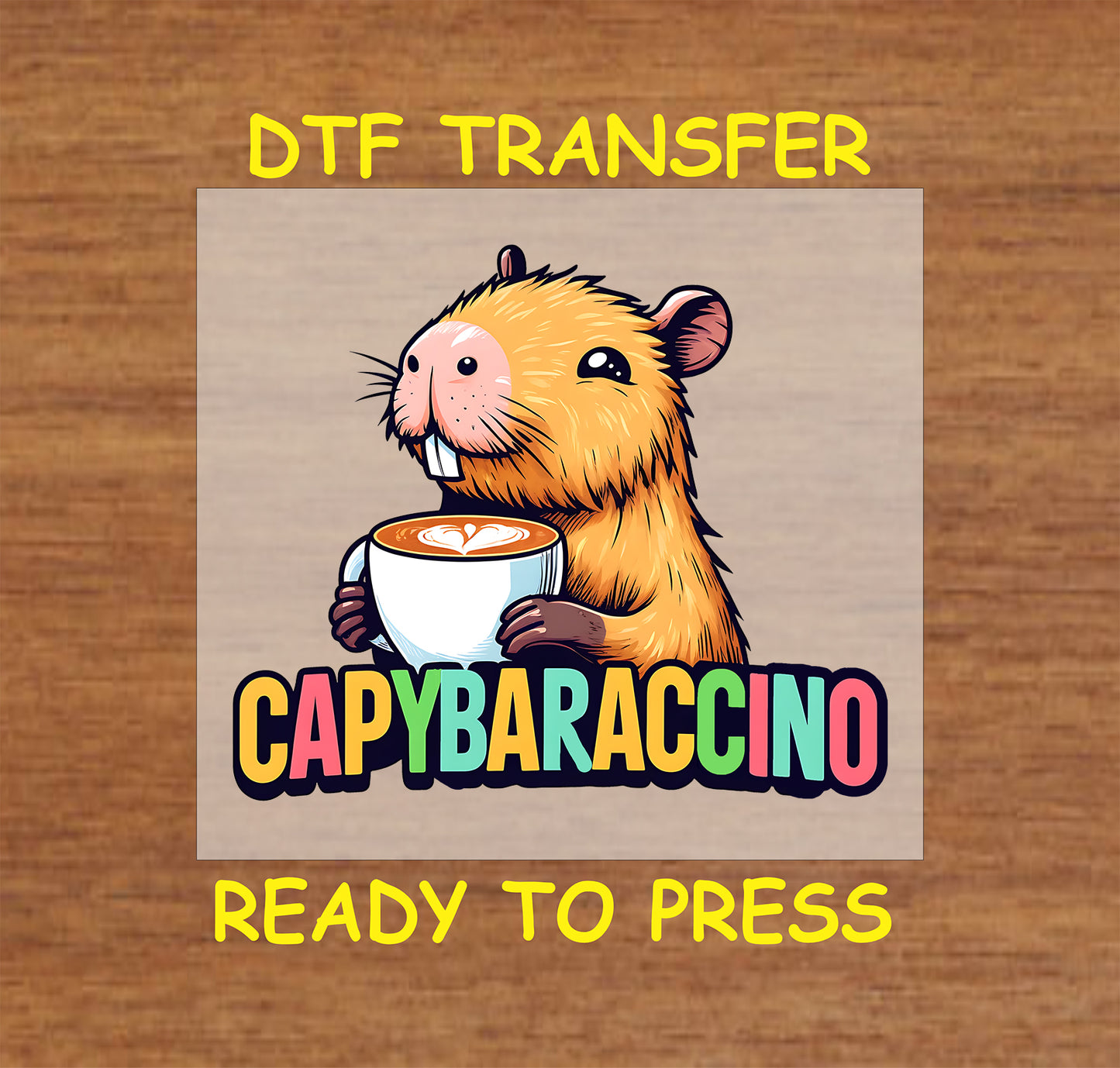 Capybaraccino DTF transfer featuring a capybara holding a cup of cappuccino with colorful text beneath.
