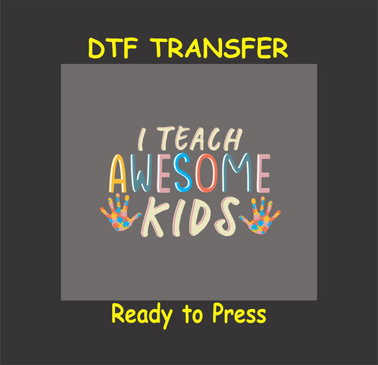 Colorful "I Teach Awesome Kids" DTF transfer with puzzle piece handprints, perfect for teachers' autism awareness apparel.