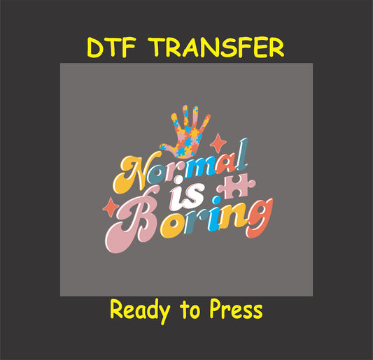 Autism Awareness "Normal is Boring" DTF transfer with a colorful handprint and puzzle-piece design on a gray background.