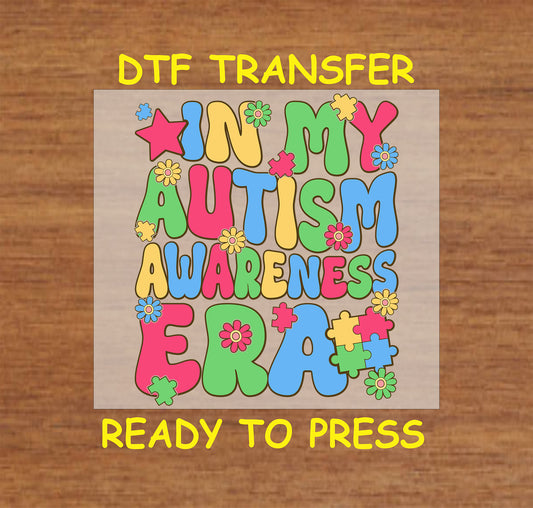 "In My Autism Awareness Era" colorful DTF transfer with retro-inspired text, flowers, and puzzle pieces.