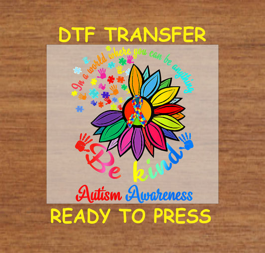 "Be Kind - Autism Awareness" DTF transfer with colorful sunflower, peace symbol, handprints, and puzzle pieces.
