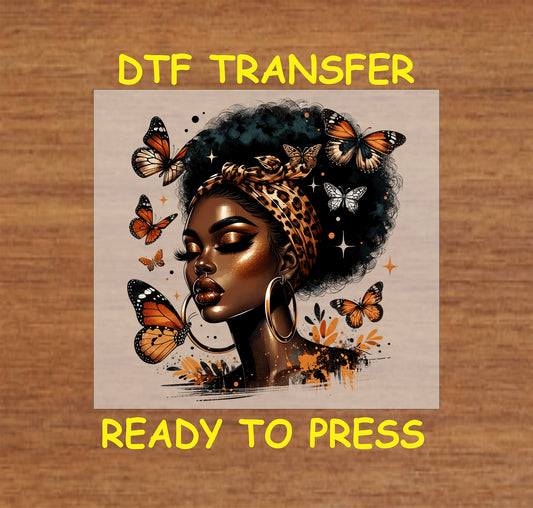 "DTF Transfer design featuring an Afro queen with bold leopard print headscarf and vibrant butterflies, ready to press."