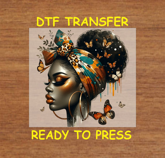 "DTF Transfer of Afrocentric woman with a vibrant scarf and golden butterflies, ready to press for custom fashion projects."