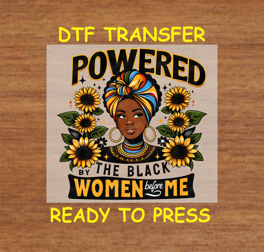 "DTF Transfer design of a woman in a colorful headwrap with sunflowers, captioned 'Powered by the Black Women Before Me,' ready to press."