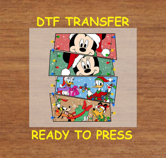 DTF transfer showcasing playful holiday scenes with festive lights and snowy backgrounds.